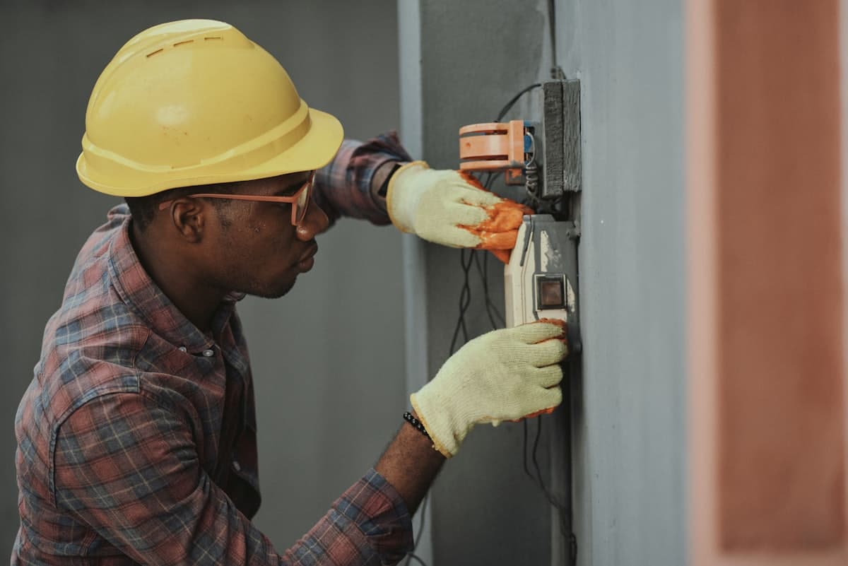 Electrician wiring an outlet
